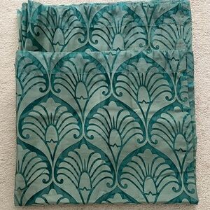 Set of Pier 1 sheer peacock curtains.